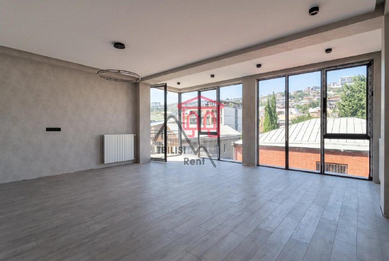 A bright apartment is for sale in a new building in the center of Saburtalo. The apartment has undergone full renovation and features three high-quality air conditioning systems throughout, two bathrooms, and panoramic windows. The owner will install interior doors. The apartment is almost completely ready to move in. — фото 2