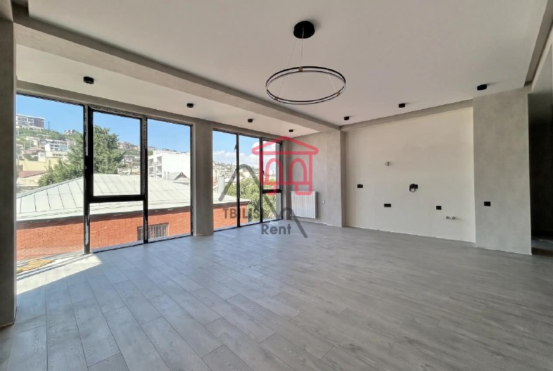 A bright apartment is for sale in a new building in the center of Saburtalo. The apartment has undergone full renovation and features three high-quality air conditioning systems throughout, two bathrooms, and panoramic windows. The owner will install interior doors. The apartment is almost completely ready to move in. — фото 3