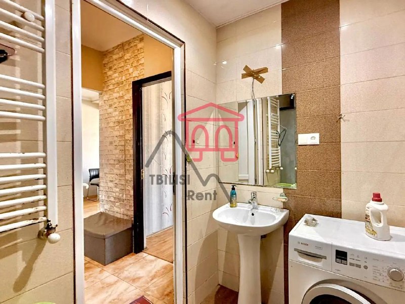 A bright and cozy two-bedroom apartment in a new building, featuring a spacious living room and a balcony. It has a well-designed layout, a modern kitchen, and everything you need for a comfortable life—central heating, an air conditioner, and a dishwasher. — фото 4