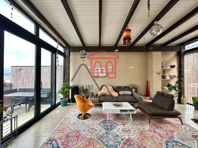 A spacious apartment with designer renovations in Vake is for sale. It's on the second-to-top floor and features a balcony, a spacious terrace with city views, and a covered attic. Two bathrooms, a walk-in closet, all necessary appliances, and heated floors. — фото 2