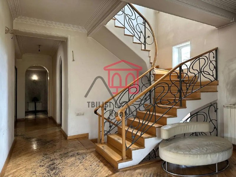 A two-story house with a plot of land in Samgori, Tbilisi, is for sale. The house features 5 bedrooms, a living room, a separate kitchen, a basement, a wine cellar, a sauna, several adjacent utility rooms in the courtyard, 2 bathrooms, and an off-street parking space. — фото 3