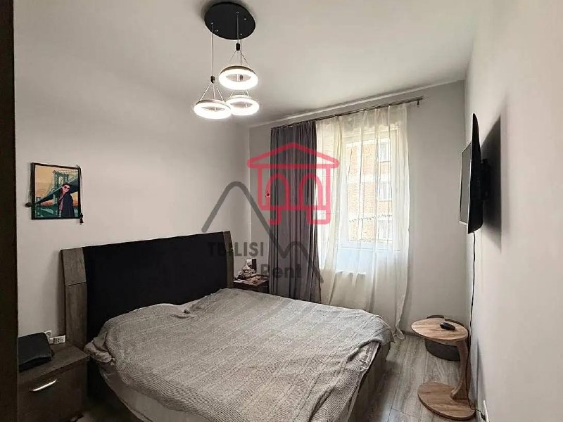 A cozy apartment is for sale in a green and quiet neighborhood, near parks, playgrounds, and areas for walking dogs. The location offers comfortable living for a family. There is an option to purchase a parking space separately. — фото 5