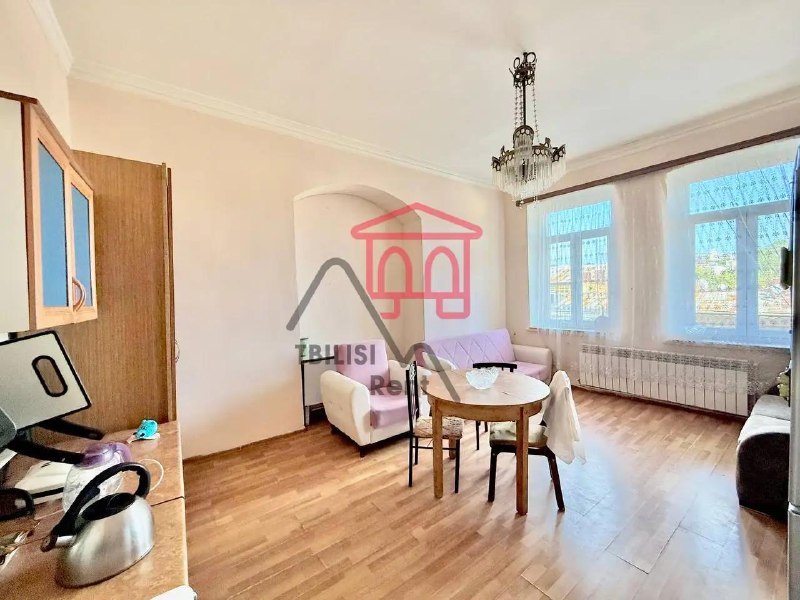 A cozy apartment with its own attic and access to the roof is for sale. — фото 1